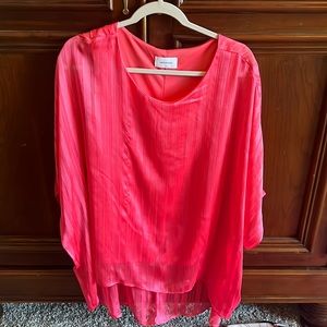 Beautiful melon color blouse. Purchased from a boutique in south GA. Worn once.